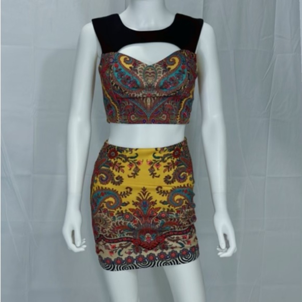 Bebe Multi print two piece set. With cut out on crop top in front.